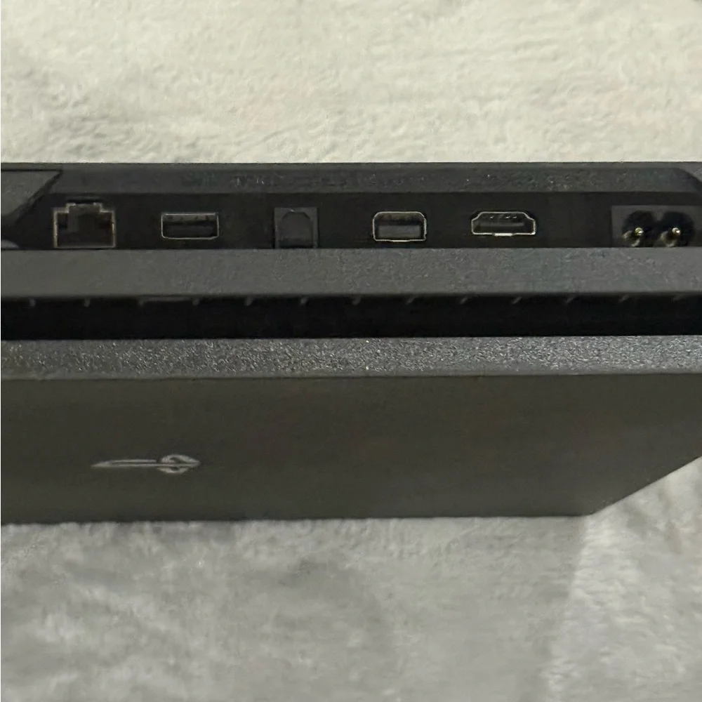 Sony PlayStation 4 1 TB Console & Dual Shock Wirless Controller, EUC